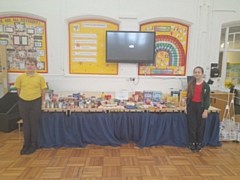 Head boy Deacon and head girl Meryem with the items that were kindly donated