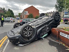 The car was flipped onto its roof