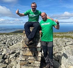 Andrew Ross (left) has raised over £5,000 for Macmillan after his wife was diagnosed with cervical cancer