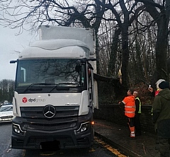 The lorry had to be cut free after getting stuck on a branch