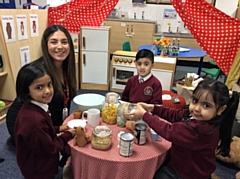 Danni Santana, EYFS lead with some of the children from Reception class