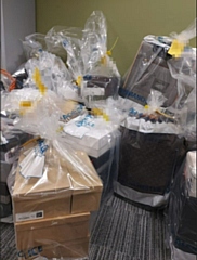 £25,000, a Rolex watch and 10 diamond necklaces as well as a number of high value designer clothes and goods were seized 