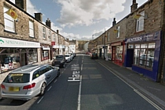 The man was hit by a van on Hare Hill Road, Littleborough