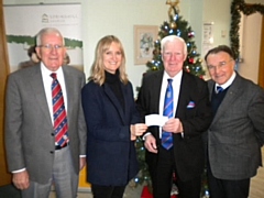 Harmony Lodge members presenting donation to Sam Wells