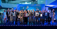 Mayor councillor Ali Ahmed on stage (centre) with the finalists and winners