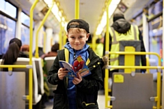 Books were given away on the Metrolink for World Book Day