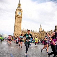 Helen McGeechan runs past Big Ben during the London Marathon