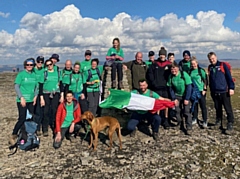 The Paolucci family and friends at the top of Ingleborough