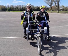 William (right) alongside Your Trust staff, enjoying his weekly cycling sessions