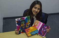 Misha with the portrait of her dad, a sunset and book of portraits