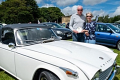 Car of the Show winner Philip Dean with Rochdale Rotary president Linda Mainwaring