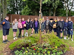 Children from St John’s Thornham school joined Middleton in Bloom and Rochdale in Bloom to spruce up the Reg Birch Community Garden in Slattocks