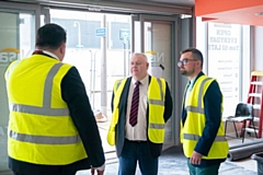 Council leader, Councillor Neil Emmott (centre) and cabinet member for housing and regeneration, Councillor Danny Meredith (right) take a tour of the facility