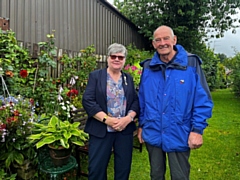 Councillor Janet Emsley congratulates Richard Simpson at the winning alleyway in Smithy Bridge