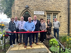 Angela Smith, Alan Webster, Graeme Douglas, Neil Emmott, Martin Taylor, Carol Edgar, Sue Cliffe, Carol Albison and Stephen Anstee attend the official opening of West Lodge Memorial Hall at Rochdale Cemetery