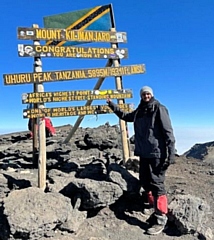 Haris Anwar Hafiz at the summit of Mount Kilimanjaro