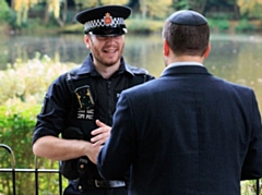 Officer talking to a resident