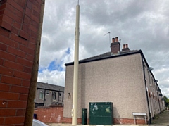 Mast erected by IX Wireless on the junction of Argyle Street and Clarendon Street in Rochdale