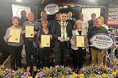 Middleton In Bloom with their awards - the town will represent the North West in the Town Centre category in the 2025 Britain in Bloom Awards