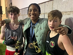 Alex Fielding (left) and Hamer boxer Bruce McCormick (right) with 2024 Olympic bronze medal winner, Cindy Ngamba