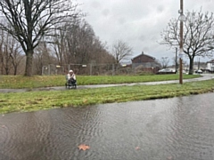 Mainway East roundabout in Alkrington left underwater following Storm Darragh