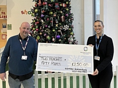 The total amount raised was £250, with Neil presenting the cheque to the hospital on 5 December.