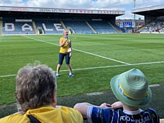 Maria Boscombe sang Sweet Caroline at Rochdale AFC as part of her challenge