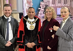 Mayor of Rochdale, Councillor Shakil Ahmed with Helen, her son (left) and her daughter (right)