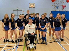 British Record Holder for 1,500m wheelchair racing Nathan Maguire trains Sports Ambassadors from Whitworth Community High School in Boccia