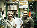 Jay Patel from Buersil Post Office and local resident Pat Colclough with petitions