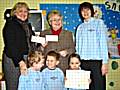 Jane Leach, Lis Kay and Melanie with some of the Children and the Money