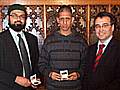 Mohammed Asad Receiving the fair play award on behalf of Real Deeplish from Yasrab Shah and Phil Woolas MP