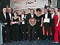 Leach team accepting their award form Pall-Ex MD, Hilary Devey