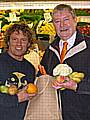 Councillor Alan Taylor, Leader of the Council, using a sustainable Bag for Life to buy fruit and vegetables without packaging from Paul Smedley at Paul's Fruit and Veg stall in Rochdale Market