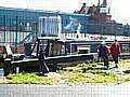 Canal boat passes through a lock on the Rochdale Canal