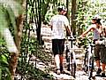 Couple on a woodland bike ride