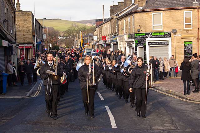 Littleborough Band leading the Remembrance Parade down Hare Hill Road