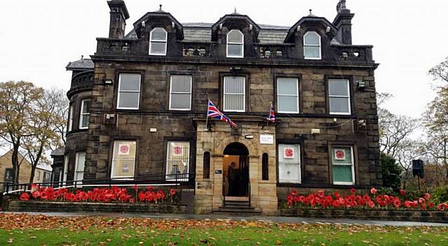 Hare Hill House decorated with poppies for Remembrance Day