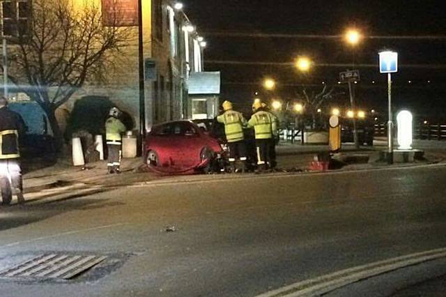 The wrecked car outside The Wine Press