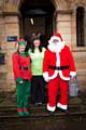 Janine Rez with Santa and his Elf